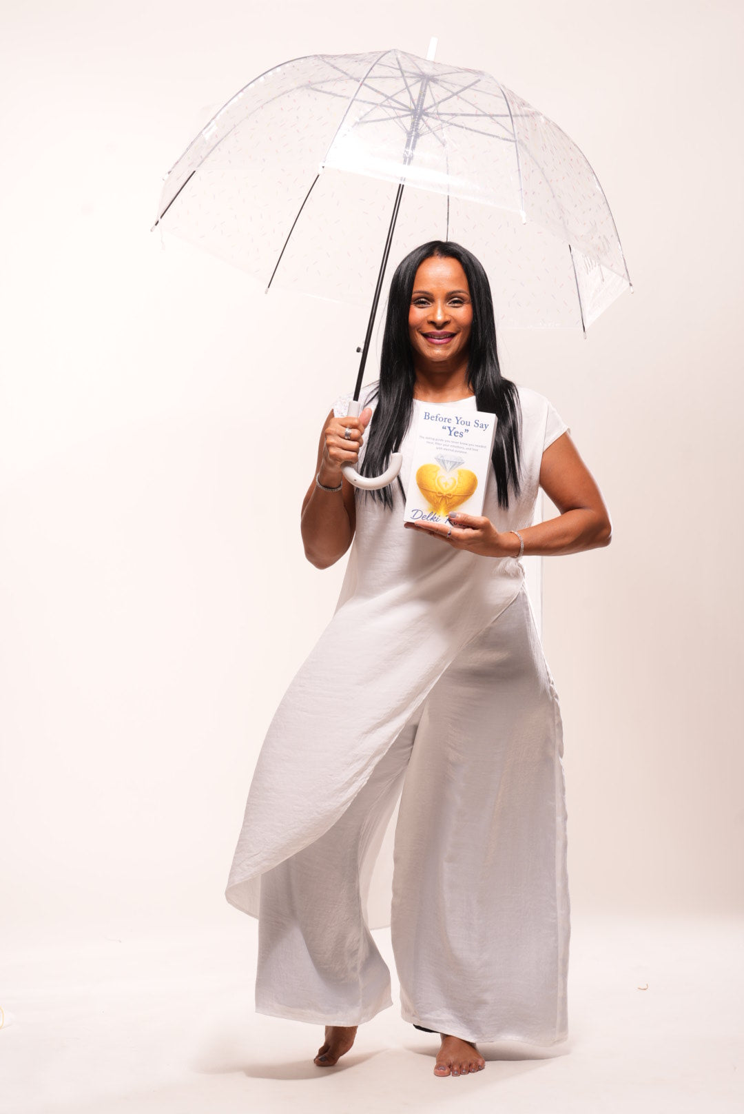 White silk cape with sequin decor on shoulder