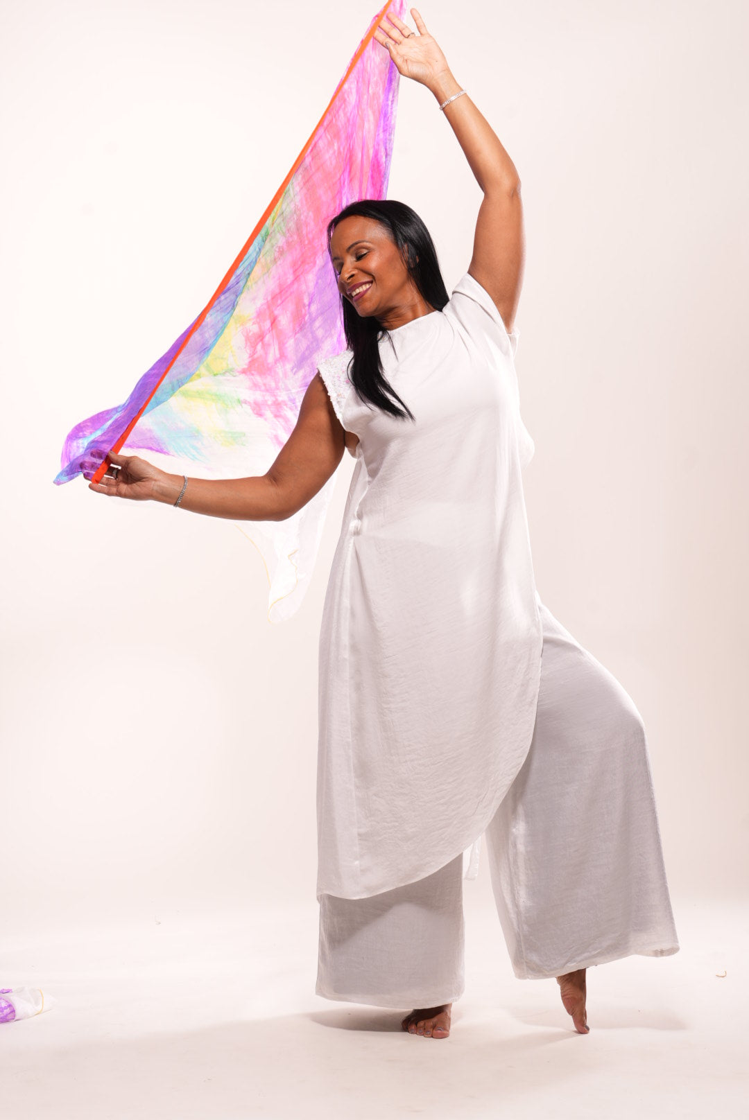 White silk cape with sequin decor on shoulder