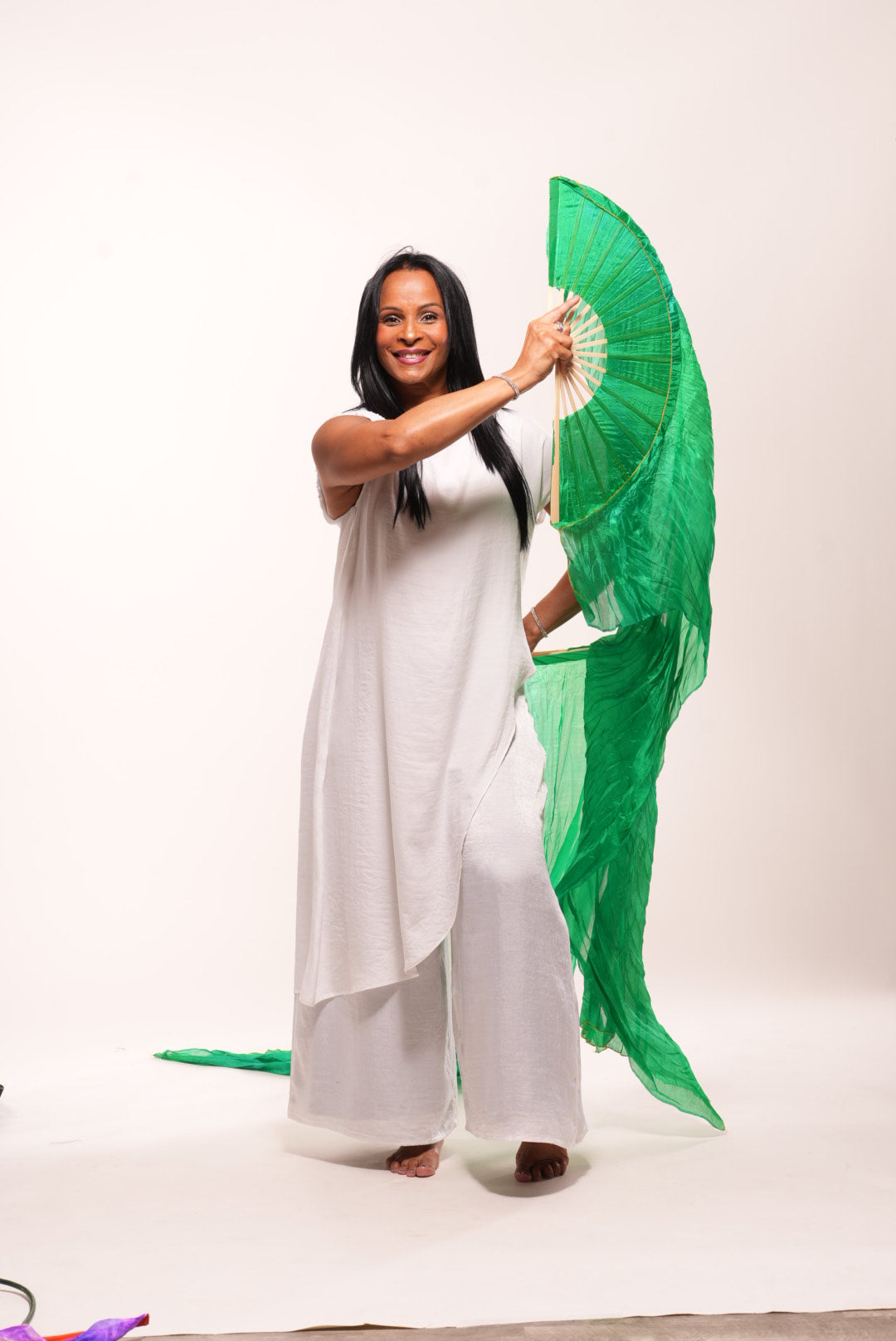 White silk cape with sequin decor on shoulder