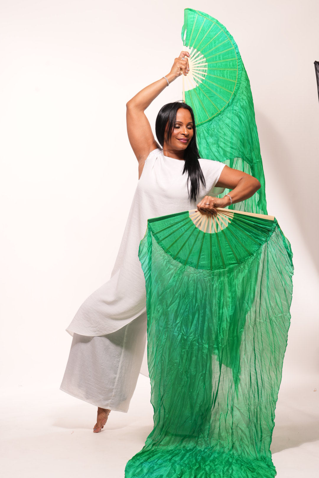 White silk cape with sequin decor on shoulder
